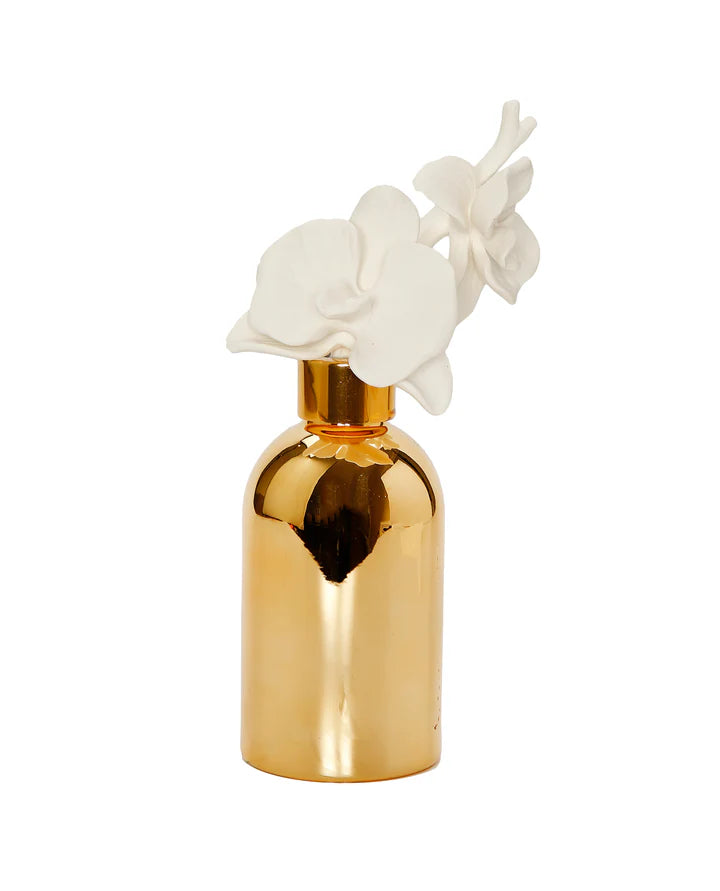 Gold Bottle Diffuser with Gold Cap and White Flower,