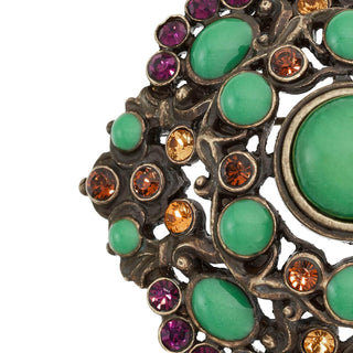 Bronze Brooch with Green Jewels